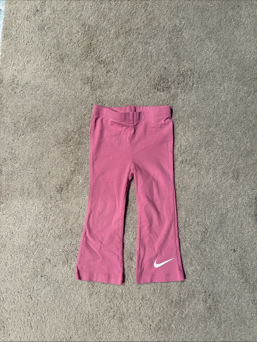 Nike Kids Pink Flared Leggings with White Swoosh